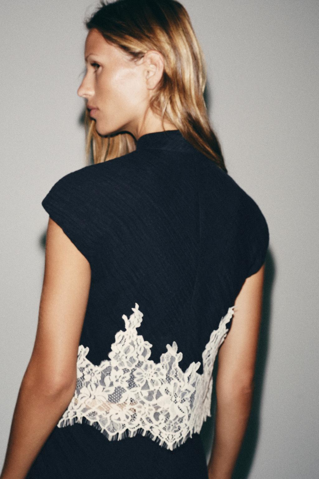 Falvicci -Short top with a stand-up collar and short sleeves
